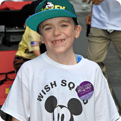 emerson with a mickey shirt and hat