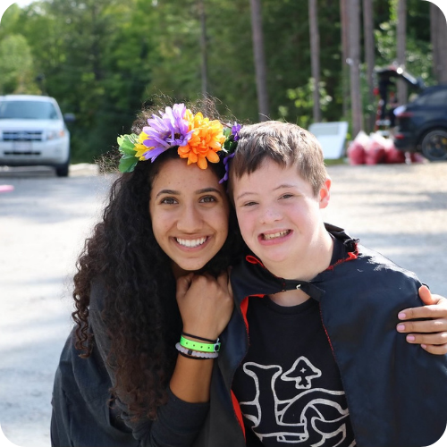 maram and camper outside at camp