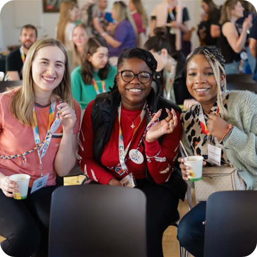 volunteers at campfire circle community conference